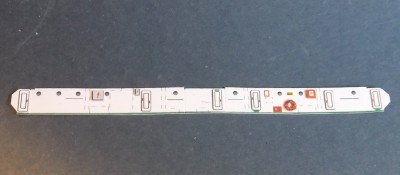 Mur de chantier équipé de petites pièces...