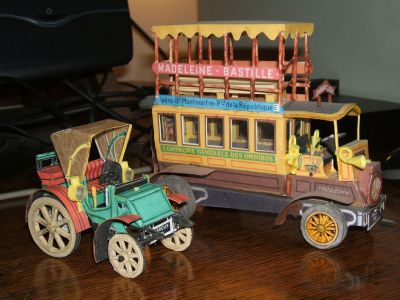 marcus  1873 et gobron brillié 1906
Les échelles sont assez proches pour qu'on puisse les présenter ensemble.
On trouve ces modèles sur le site de Patricia , mais attention, si vous les construisez tels que prévus, ils seront beaucoup plus simplistes. Mais bien jolis quand même.
Si quelqu'un a les quelques numéros manquants (1, 8 , 9 , 10 , 11 , 14) qu'il les exhume !
Depuis, ils sont tous sur le forum.
